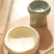 Charger l'image dans la galerie, Minimalist elevated ceramic cat bowl in neutral white, green, and gray-blue tones for modern home decor